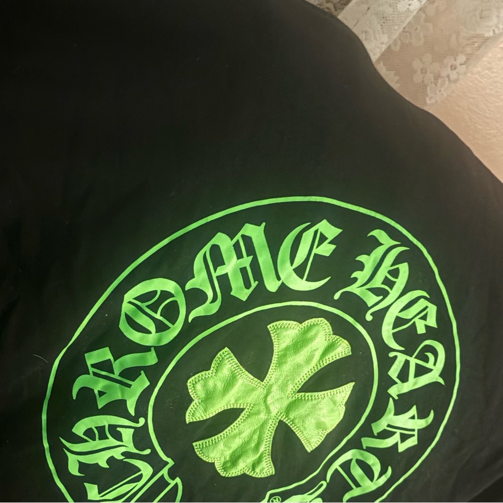 Black Hoodie with Green Graphic
Chrome hearts